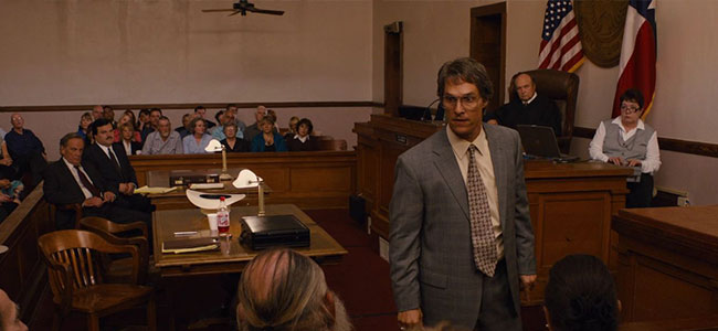 Movie still of court proceeding in Bastrop Courthouse Courtroom