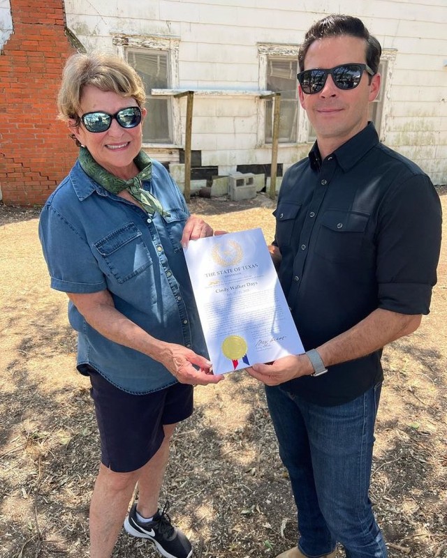 TMO Director Brendon Anthony presents Cindy Walker's niece, Molly Walker, with a proclamation from the State of Texas recognizing the inaugural Cindy Walker Days.