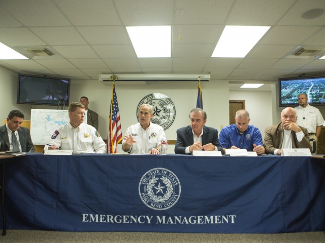 Governor Greg Abbott discusses with local emergency management and Commission To Rebuild Texas Image